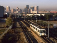 An LRT train accelerates out of Coliseum Station. That is where the Oilers used to play until the NHL extorted Edmonton into building another arena downtown. Commonwealth Stadium, another sports boondogle may also be seen.
One more editorial. Edmonton put in this LRT line because Calgary had one. Calgary's went where people lived. Edmonton's, not so much. It took them forever to get to the University and beyond. I think that it is now a reasonable system.