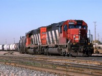 Another eastbound train at the east end of the old intermodal yard. This looks like it might be headed to Beamer/Scotford/Fort Saskatchewan but I cannot be certain of that.
Although these have the distinctive CN snow shield behind the cab, they still don't look normal with no dynamic brake blister. If folks have read any of my previous post on this matter, they will know that I much prefer the looks of the spartan cab over the "Comfort Cab".