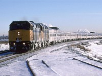 the "Canadian's" trip across the prairies east of Edmonton must have been much more brutal than experienced here. Alberta is experiencing the "Idaho High", a period when a high pressure zone sits on Idaho, giving us "warm" dry conditions.
The train is partially on some temporary tracks so that a bridge can be constructed on the original alignment   