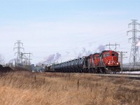 I am not exactly sure what is going on here, but the Clover Bar Transfer is headed south down the Camrose Sub with what would be a typical Clover Bar Yard to Walker Yard consist. Perhaps they are going to switch an industry down this way, before going to their destination.