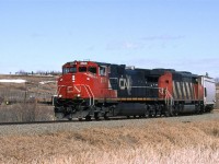 This is another area that I found by studying topo maps. The Camrose Sub winds down this valley from the town of Camrose to cross the Battle River Valley. My hopes were that I could obtain a view looking up this small valley from the south rim of the Battle River Valley. Trees and houses precluded that plan. I always wanted to explore this small valley for photo opportunities. I will manage to see the upper end but I was not able to really get to know the bottom  area. There are several wooden trestles in this small valley.
Ferlow Junction, in the Battle River Valley is where a branch splits off the Camrose sub. The branch, whose name escapes me, went to Stettler and may have been spun off to a tourist line at this time. That branch may be seen at far right.
444 is the daily Edmonton to Calgary manifest train. 