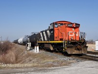 CN 1437 stretches out to Blackwell Sideroad to make a rare mid day switch at Procor in Sarnia.