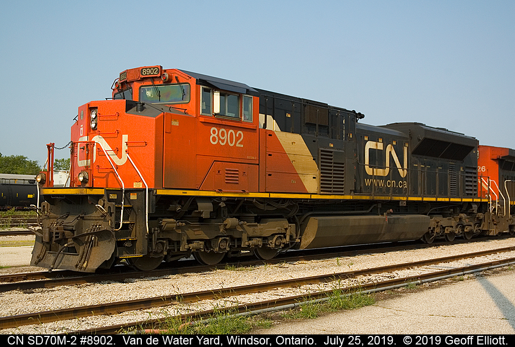 CN SD70M-2 #8902, power for train 438, lays idle at CN Van de Water yard in Windsor while waiting for departure later in the day on July 25, 2019.
