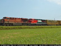 CP 8858 leads Train #141 with foreign visitor Ferromex ES44AC #4647 past Wallace Line in Puce, Ontario on July 26, 2019.