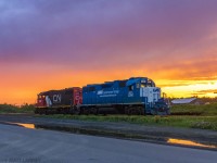 Leaser to CN, GMTX 2260 leads CN Edmundston local 578, running around their train after doing some switching at Grand Falls, New Brunswick. We arrived here just in time, to witness the awesome sunset gleaming behind the train