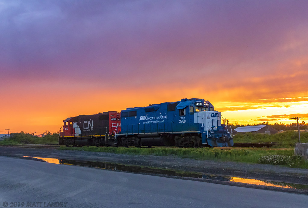 Leaser to CN, GMTX 2260 leads CN Edmundston local 578, running around their train after doing some switching at Grand Falls, New Brunswick. We arrived here just in time, to witness the awesome sunset gleaming behind the train