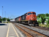 With sd75I 5761 on point, CN 384 motors through Georgetown GO eastbound shortly after 11 and it is a beautiful Sunny Sunday morning! Trailing units were C40-M8 2407 and Dash 8-40CW 2193 both in CN paint. There ended up being a few foamers actually who decided to take advantage and come to Georgetown this fine morning including I myself. The last railfan on the left at the end of the platform happens to be a well-known RP.ca contributor Jason Noe. His life long railfan Buddy Jason Bartlett is standing right next to him and we had one last detected railfan who goes by the name of Matthew and he is standing a bit closer to the train in the middle and taking photos of the power with his I-pad! Weekends on the Halton are always worth a try! 