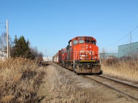 The daily CN local heads back west after working a transload facility on the Chrysler Spur. 