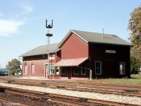 CN's Wyoming station (originally built by the GTR, and by now clad in insulbrick) is pictured in November 1972 along the Strathroy Sub at Mile 45.3. The station did survive into at least the mid-80's, but at present day a small VIA "kiosk station" serves Wyoming.