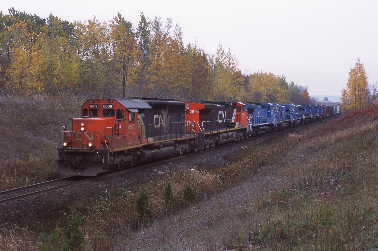 It was that time of the year again, when the shared LMS units got to do their stint on CN. CN 334 is seen here at mile 30 of the Halton Sub with six LMS units in tow.