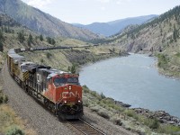 CN 3028 with the CREX 1517 heading east along the Thompson River at Drynoch - MP77 on the CP Thompson Sub. The Skoona tunnels - CN Ashcroft Sub, can be seen in the upper right of the image. 

GPS Approximate. 