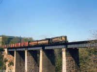 CP RS18 8744, FB1 4416 and a leased Bessemer & Lake Erie 700-series F-unit cross the Humber River bridge with an eastbound freight on the approach to Lambton Yard in May 1965.
<br><br>
The B&LE unit was one of a handful of foreign road units that power-short CP had on lease at the time. CP 4416 was one of the few FB1's that wasn't traded in to MLW on new C424 units in the mid-60's.