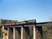 CP RS18 8744, FB1 4416 and a leased Bessemer & Lake Erie 700-series F-unit cross the Humber River bridge with an eastbound freight on the approach to Lambton Yard in May 1965.
<br><br>
The B&LE unit was one of a handful of foreign road units that power-short CP had on lease at the time. CP 4416 was one of the few FB1's that wasn't traded in to MLW on new C424 units in the mid-60's.