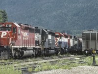 CP 5729 / NS 1614 / BCR 6204 / SOO 737 and CP 8212 at far right, are shown here at SNS Farwell. Farwell is the first station west of Revelstoke on CP's Shuswap Sub., and I can remember feeling pretty lucky to have stumbled upon this scene. 