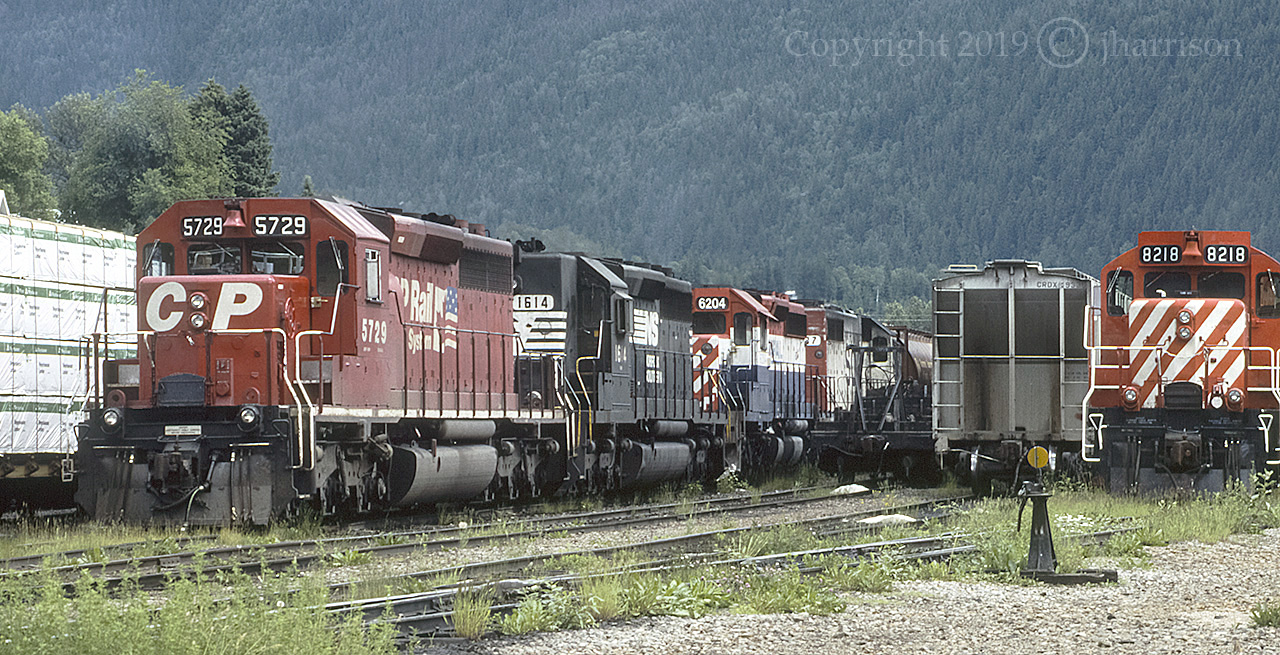 CP 5729 / NS 1614 / BCR 6204 / SOO 737 and CP 8212 at far right, are shown here at SNS Farwell. Farwell is the first station west of Revelstoke on CP's Shuswap Sub., and I can remember feeling pretty lucky to have stumbled upon this scene.