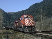 CPXE 5868 with the 5995 trailing is making it's way through Nicomen. The RCU's were CP 6024 and 5704. SNS Nicomen no longer exists but was, at the time, the next stop west of Harrison Mills B.C. GPS is approximate.