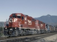 CP 5709 with the 5480 and CR 805 trailing, are westbound and approaching MP61.3 on CP's Cascade Sub at Agassiz. 