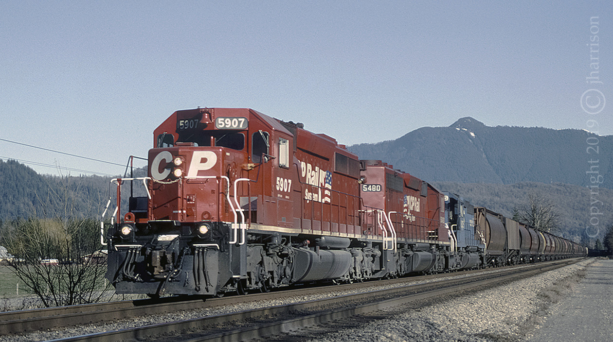 CP 5709 with the 5480 and CR 805 trailing, are westbound and approaching MP61.3 on CP's Cascade Sub at Agassiz.