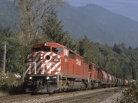 CP 9011, an SD40-2F, is seen headed westward at the village of Deroche B.C.