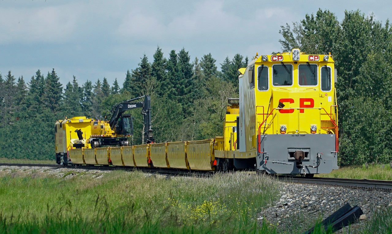 Canadian Pacific originally contracted to build 2 of these self-propelled M/W trains. They now appear to have at least 3 as this is unit #3 (9507-30 "A" end and 9507-31 "B" end) seen here working on the Leduc Sub just south of Ponoca.
