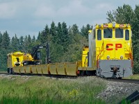 Canadian Pacific originally contracted to build 2 of these self-propelled M/W trains. They now appear to have at least 3 as this is unit #3 (9507-30 "A" end and 9507-31 "B" end) seen here working on the Leduc Sub just south of Ponoca.