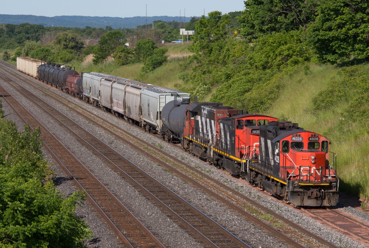 CN 550 returns to Aldershot after picking up some cars in Hamilton.  On this day they had the CN 4028, CN 1439, CN 4717 as power for their train.