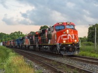 CN 434 blasts by Powerline Road with a sweet consist of CN 3881 CN 3147 CN 2275 GECX 2040 CN 2521 CN 5749 EJE 663 CN 4721.

Thanks to Jimmy G and John G for the heads up on this one, I kind of dropped the ball not seeing it at London so was glad I made it out here to get them!