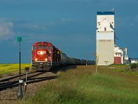 True Canadian branchline action at it's finest. With canola fields on one side and a grain elevator on the other, a trio of four axle power leads a grain peddler along 100+ year old jointed rail. 