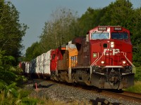 CP 119 blasts through Springwater approaching Midhurst with a colorful consist of CP 8028 (formerly 9575), UP 8200 and CP 4513 on the head end plus CP 8735 working mid train, cleared to MacTier on an already humid morning for 08:30, the dog days are here! 