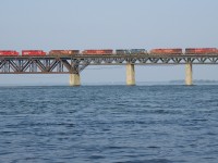 CP 253 has 7 units (CP 8941, CP 8751, CEFX 1031, CP 8705, CP 9840, CP 2253 & CP 2260) as it crosses the St. Lawrence River, its journey from Saratoga Springs nearly over. Three of these units had gone south on grain train CP 350.
