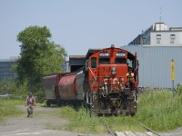 CN 7229  and CN 9515 are about to leave the P&H mill with 3 grain empties to take to the nearby Pointe St-Charles Yard. 