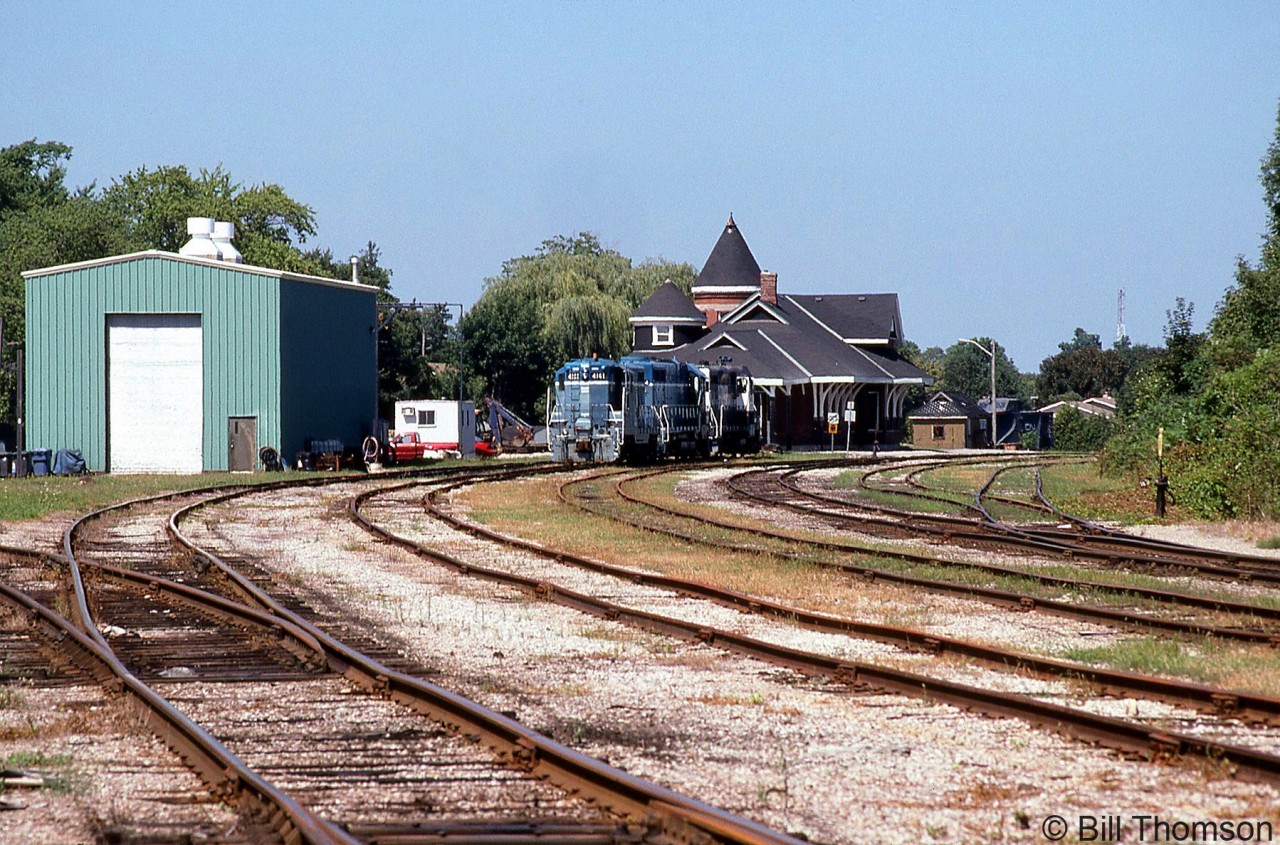 An overview of Goderich during the heyday of GEXR. Visible in the background is the former CN Goderich station off Maitland Road South, with a few GEXR units parked nearby: 4161 (a former GP7 rebuilt into a slug), GP35m mother unit 3834, and GP7 2127 still lettered for the Georgia Southwestern RR. The small shop building is off to the left, and one can see GEXR's ex-CN 55413 black plow parked off in the distance.

GEXR (under G&W ownership) has since handed back its operations of the Guelph Sub that it had leased from CN, but still operates the Goderich and Exeter Subs in the area.