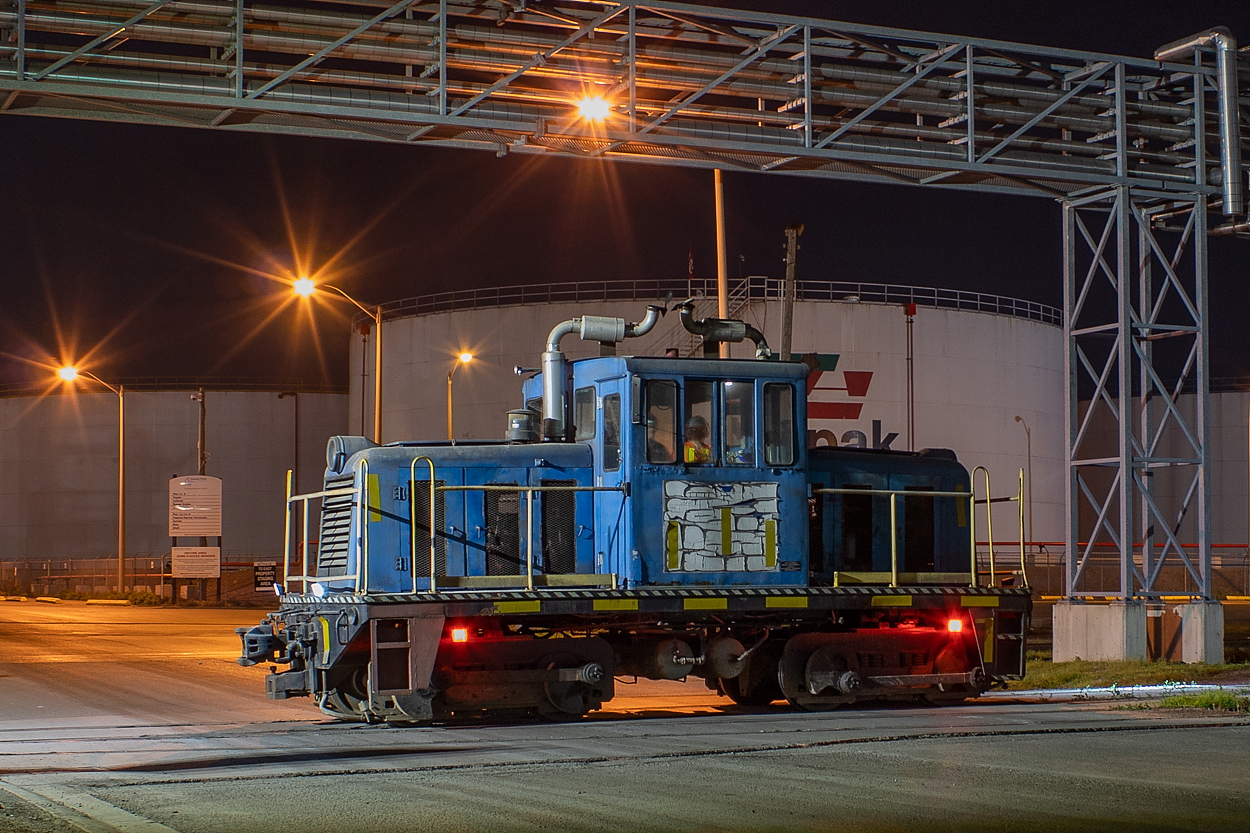 I was out doing some night shots in Hamilton and saw the Bunge critter working to bring empty meal hoppers into the plant for loading. After they'd dropped some loads in the yard, they stopped on Victoria Ave to throw one of the switches on either side of the road long enough for me to grab a couple of shots from the corner at Burlington Street. It was a fun evening for night shots, as later on I came across 555 at NSC.