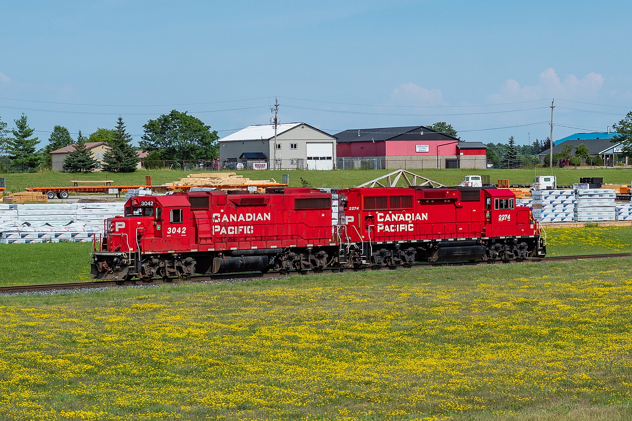 As I noted in a comment in this shot from Jason Noe, I have wanted to see a train here in Ayr for a little while now. I had set out this afternoon for 435, but arrived in Paris a bit a head of it. Having remembered seeing T72 outlaw in Wolverton before they had a chance to get to Ayr on Saturday back in November, I thought I would head up here just in case, as I had time to kill anyways. As it happens, I got here just as T72 was about to shove back onto the wye to set off about a half dozen or so hoppers at FS Partners. It appeared they had already lifted the empties which were sitting out towards the main.