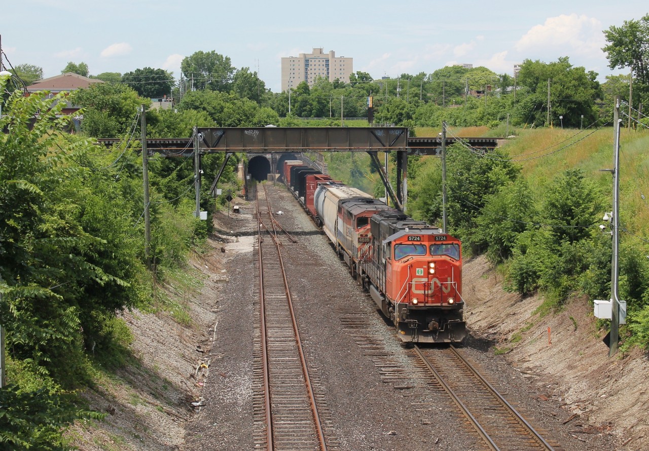 CN M320 exits CP's Detroit River Rail Tunnel after being rerouted from the Flint Sub in Michigan due to the ongoing tunnel closure in Port Huron/Sarnia. M320 is the train's reroute ID but I'm unsure of what the regular ID would have been. CN is rerouting several trains via CP's tunnel between Windsor and Detroit and then utilizing the Chrysler Spur and VIA/CN Chatham Subs to get to the Strathroy Sub at Komoka.