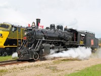 Alberta Railway Museum's 4-6-0 CN 1392 leaves the yard heading for the station to pick up it's passenger train.