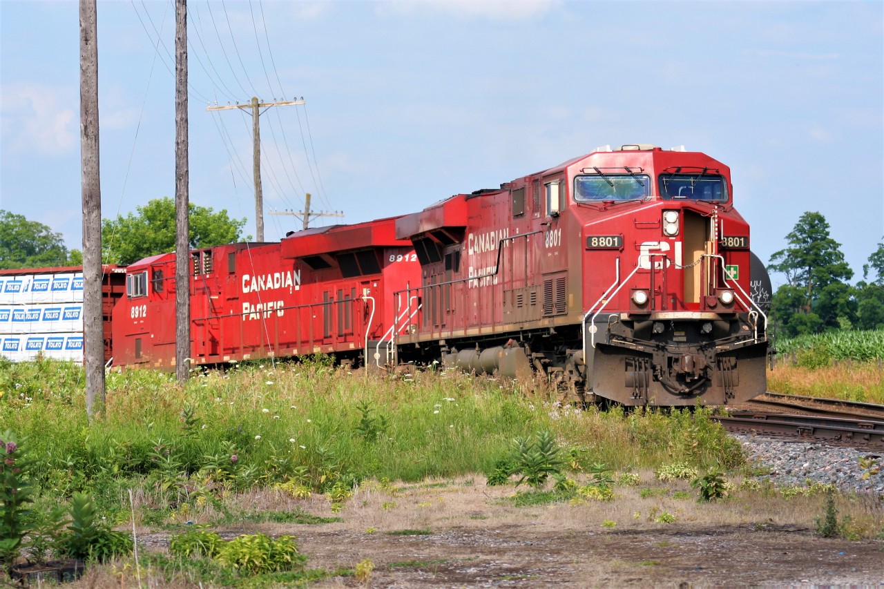 On a hot late summer afternoon, CP train 255 works the Canwell Building Materials facility off Dumfries Road with 8801 and 8912. This was the first time I had ever seen six-axle units on this customer's spur.