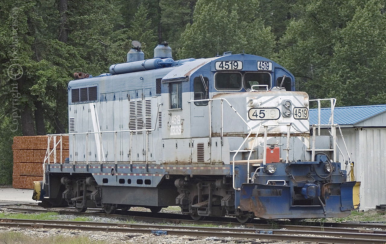 The ex GTW & IRRS EMD GP9 4519 was built in 1957. First numbered GTW 4919, the now Nelson and Fort Sheppard 4519, since 2012, is seen here shutdown in the siding at the Atco Wood Products mill in Fruitvale B.C. The mileage listed on the cross bucks at the entry crossing to the mill reads 149.91. At one time the unit delivered product from the mill to the U.S. border where there's a connection with the BNSF Nelson Sub. It might still but there are signs that the 4519 hasn't moved in a very long time.
