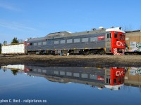 A whole lot of water was purchased at Wal-Mart to create this lake to reflect 1501 in Guelph, Ontario. I certainly had time. Of course, i'm kidding, but Snake would wish to believe otherwise ;) <br><br>I'd like to remind everyone of this photo, 15106 back in 2006 en-route to be rebuilt - a complete suprise to me and I don't know of many who got it in <a href=http://www.railpictures.ca/?attachment_id=12219 target=_blank>this condition</a>