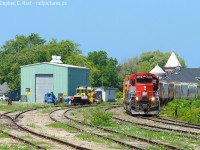 Well, Bill, your spidy senses must have been tingling knowing someone was in Goderich.. and here was the scene on Sunday as 581 finishes pulling 15 loads up the hill. Behind the train are the empties, 18 for the salt  mine and 1 for Broadgrain. We do a family/friends trip camping somewhere each summer and this year was Aburn Ontario.. after looking up where it was... I made sure to bring my camera and take my chances at something running, it's been a few years since I've been to town.