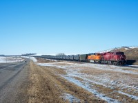 Eastbound crude oil loads from Rosyth Alberta are making good time just west of Biggar Saskatchewan. The clean EMD trailing was a nice change from the norm. 