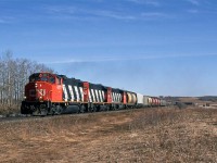 Continuing south down the Camrose Sub with Fred Clark.....
Apparently, we were easily able to catch and pass the train as it traversed the tracks through the Battle River Valley, but we did not know it. Once we realized that we must be ahead, we staked out this spot south of Bashaw and waited. 
The next stop for the train will be Mirror AB, where the crew will spend some time switching. From there, the train will run up the Brazeau sub to at least Red Deer.
