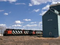 We waited at Haynes (7 miles east of Joffre) for quite some time for the 550 to arrive. With only a 50mm lens at my disposal, I managed a less than satisfactory image. ( I would chase the 550 again soon, and the elevator at Haynes, quite similar to the one in Joffre, would be gone.
I do not believe the Joffre elevator had much life left either.