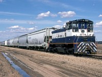 I don't know why, but we abandoned our chase of CN 550, to photograph the Nova Chemicals plant just south of Joffre AB. Note the increasing clouds.
For those that are interested, this is a SW1500 built for SP in 1986
Nova had a series of crackers at this site (feedstock was likely gas) and they made ethylene amd polyethylene pellets)
