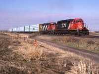 A typical wood product train from Prince George BC, the 360 was a pretty frequent traveler on the Wainwright Sub. Two Spartan can SD-40's leading, however was rare.