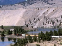 The westbound manifest is now crossing the other arm of the oxbow lake. OK, technically it is not and "oxbow lake", as it is still open to the river. 
This area is now a provincial park, though it is still not very accessible.