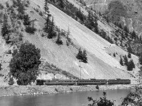 BCR passenger train running toward Vancouver along the channel that feeds a couple electric generation stations.
This photo had to be monochromed. I learned the hard way that Fuji film containers were not was watertight as Kodak containers. I routinely kept film in the cooler while on camping trips. Ice melts and usually this is not a problem. The film kept in Fuji canisters got wet (luckily, I only had one) and affected the film in various ways. I lost several shots, but managed to salvage a few with digitalization. 