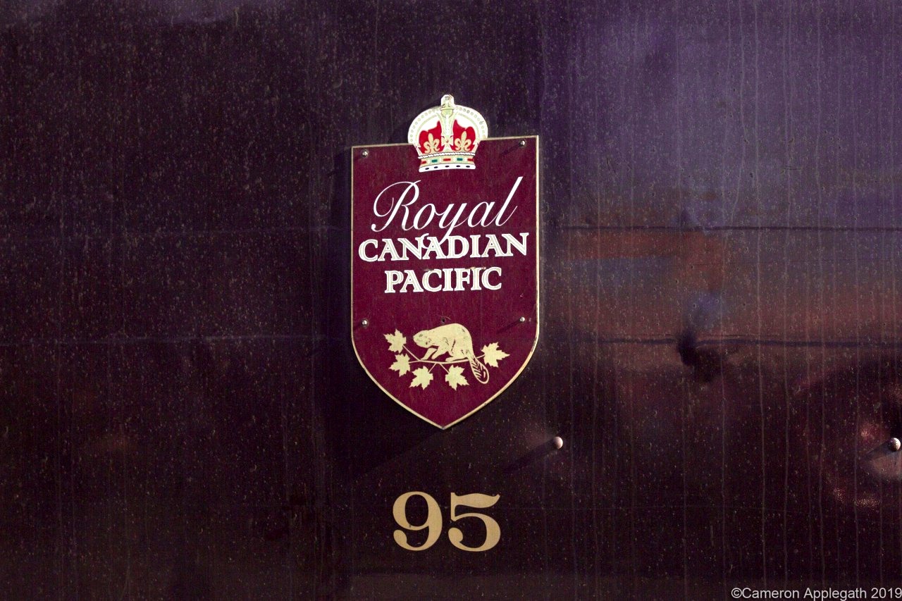 A classic herald depicting the infamous beaver atop a branch sprouting maple leaves with CANADIAN PACIFIC RAILWAY under the colonial English crown.

Spotted on CP 40B-13, the RCP consist in town for LPGA Women's Open in Richmond Hill.