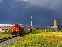 After heading through severe thunderstorms in Moncton, New Brunswick, a pocket of sunshine appears, as train 407 rounds the bend near the VIA Rail station. 