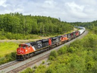 Train 407 rounds the bend at Springhill Jct, Nova Scotia. 